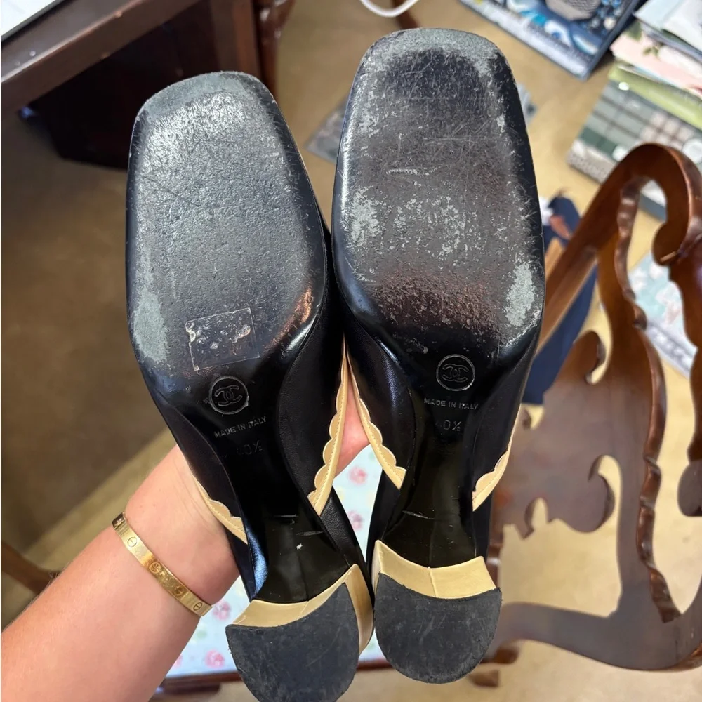 CHANEL Two-Tone Scalloped Leather Mules in Beige and Black